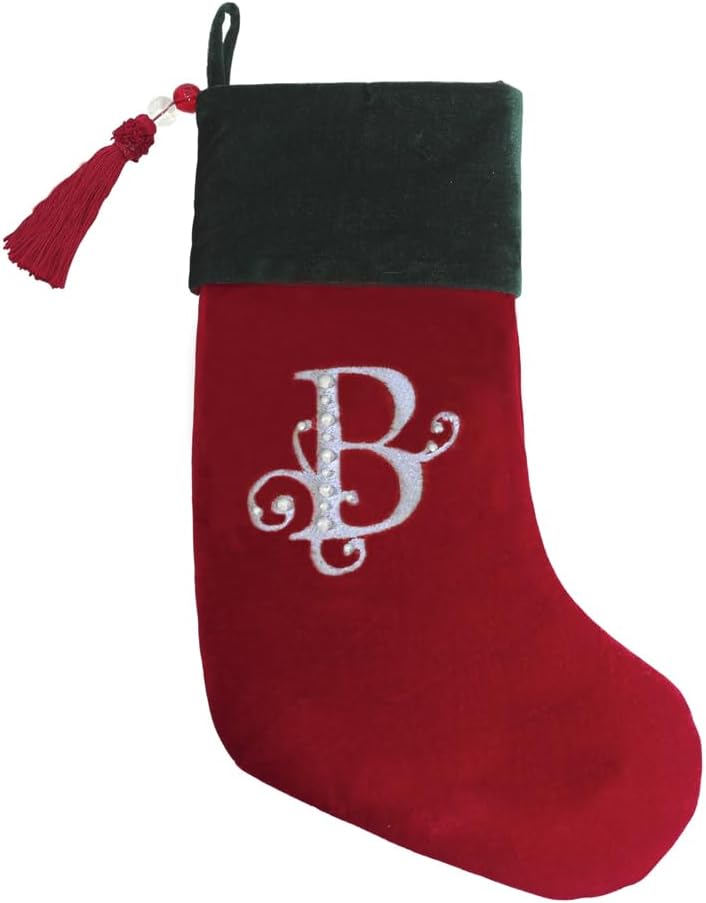 Classic red and green velvet Christmas stocking, finished with a decorative tassel. A perfect festive touch for those who prefer a simple, elegant design.