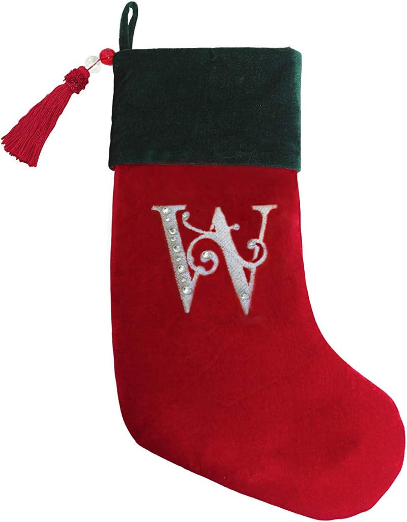 Classic red and green velvet Christmas stocking, finished with a decorative tassel. A perfect festive touch for those who prefer a simple, elegant design.